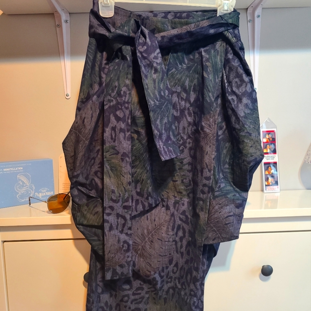 NY&Co. Over the Knee Pencil length skirt with a draped design.